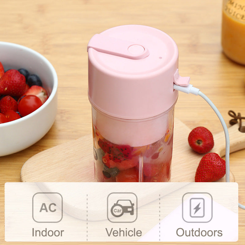 Aarenza small household juicing cup in a clear plastic container, perfect for kitchen use and fresh juice preparation.
