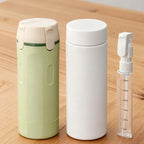 Arenzza 4-in-1 refillable travel dispenser bottles for liquids and creams, with transparent containers and secure caps.