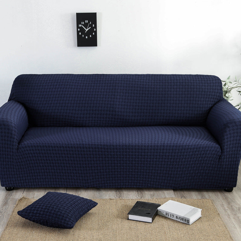 Arenzza jacquard knitted stretch sofa cover in beige protects and updates a living room sofa with elegant textured fabric.