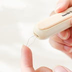 Arenzza 2-in-1 threading and seam-ripping tool for houseware and kitchen tasks, featuring a compact design and ergonomic grip.