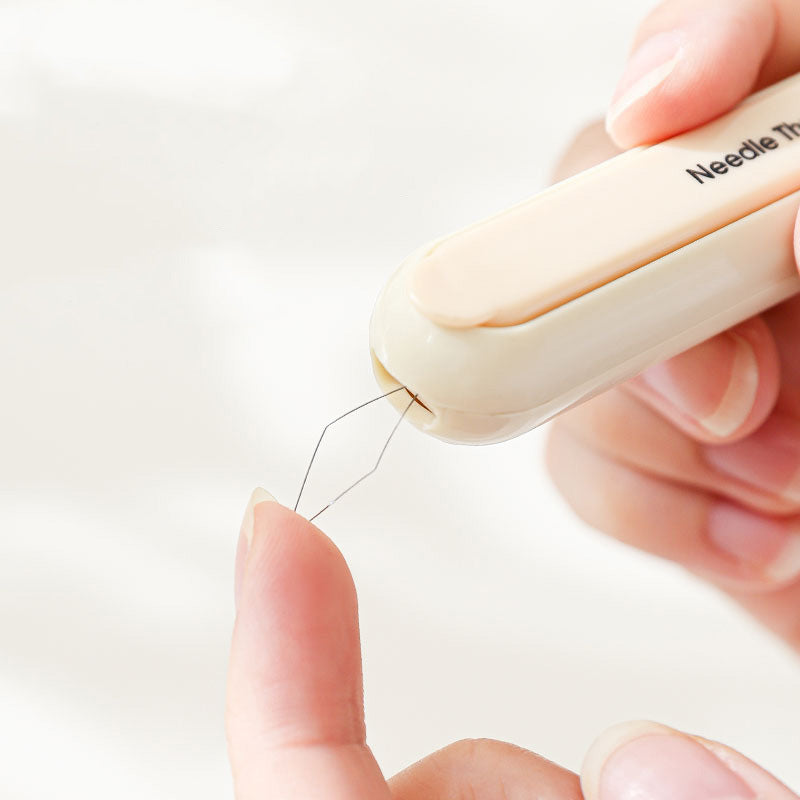Arenzza 2-in-1 threading and seam-ripping tool for houseware and kitchen tasks, featuring a compact design and ergonomic grip.