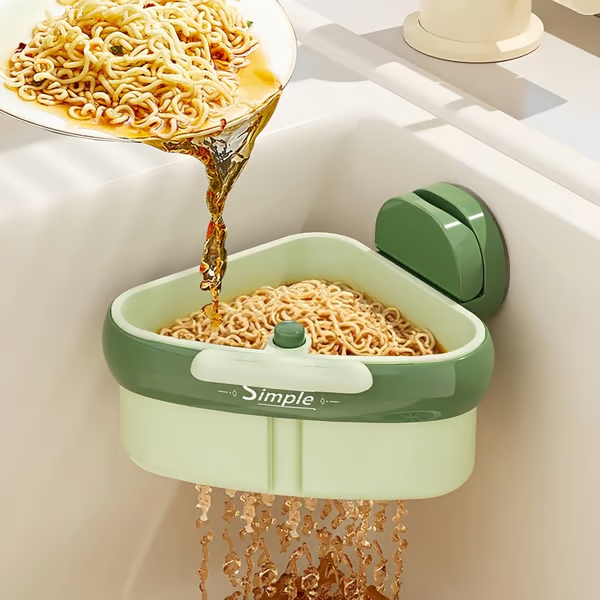 Arenzza suction cup sink corner rack in a kitchen, showcasing its compact design and secure suction cups for organization.