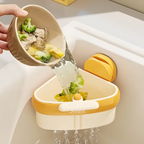 Arenzza suction cup sink corner rack in a kitchen, showcasing its corner design and secure suction cups for organizing utensils.
