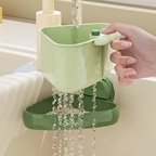 Arenzza suction cup sink corner rack in a kitchen, showing its black plastic construction and secure suction cups for organizing kitchen items.