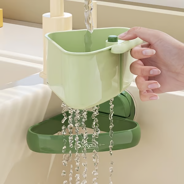 Arenzza suction cup sink corner rack in a kitchen, showing its black plastic construction and secure suction cups for organizing kitchen items.