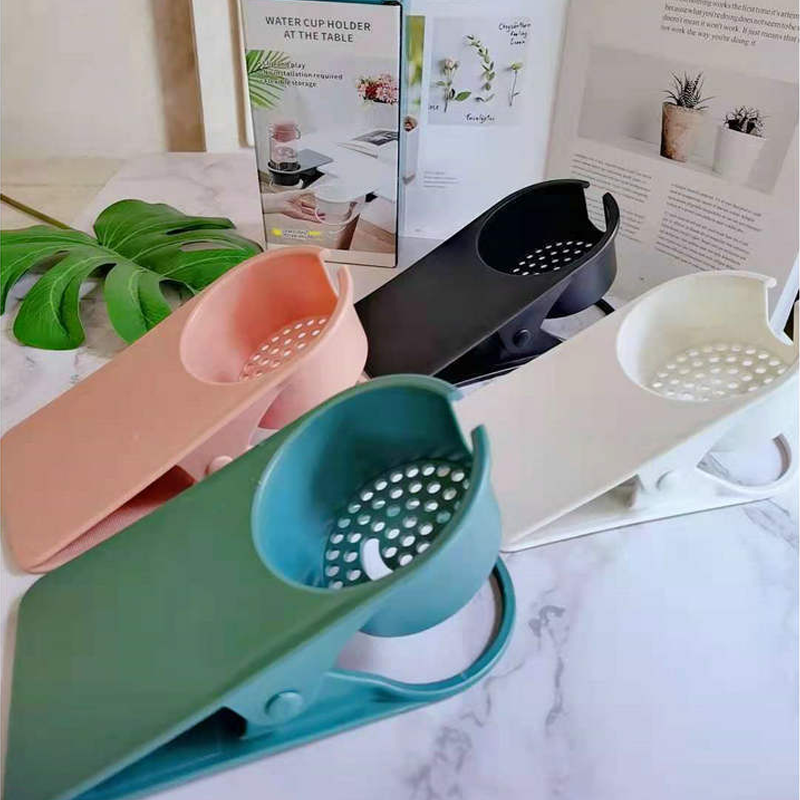 Arenzza clip-on desk cup holder attached to a desk, designed for houseware and kitchen use, holding a coffee mug securely.