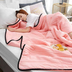 Arenzza ice cooling calming blanket in soft fabric, designed for summer sleep comfort, shown draped over a bed for a restful look.