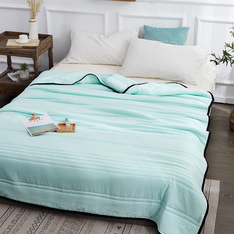 Arenzza cooling calming blanket for summer sleep, featuring ice cooling fabric and soft, breathable houseware design for restful nights.