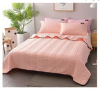 Arenzza ice cooling calming blanket in soft fabric, designed for summer sleep comfort, shown spread out on a bed.