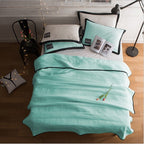 Arenzza ice cooling calming blanket on a bed, designed for summer sleep comfort with a soft, breathable fabric for peaceful rest.