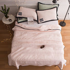 Arenzza ice cooling calming blanket in soft fabric, designed for peaceful summer sleep, shown draped over a bed.