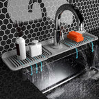 Arenzza Quick-Dry Faucet Mat for kitchen sink, black rubber houseware accessory with textured surface and drainage holes.