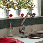 Arenzza hot and cold dual-purpose universal faucet for kitchen or household use, shown in a close-up with shiny chrome finish.