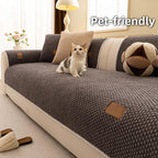 Arenzza thickened non-slip washable sofa cover draped over a sofa, showing its textured fabric and secure fit for houseware and kitchen use.