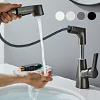 Arenzza single-hole bathroom faucet with pull-out sprayer, chrome finish, mounted on bathroom sink with modern design.