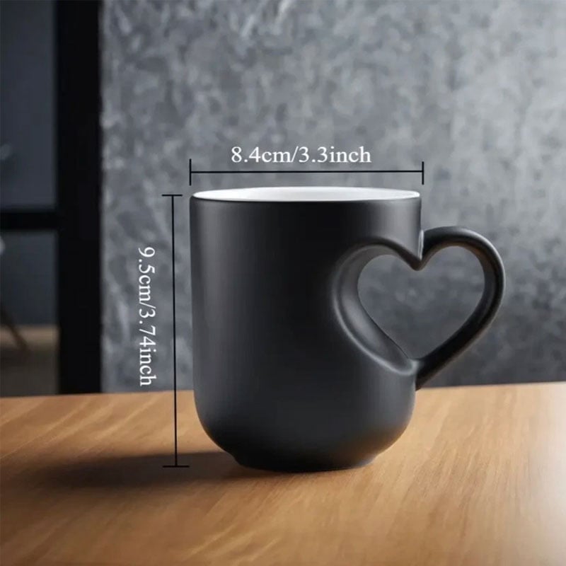 Aarenza ceramic mug with a color-changing feature and heart-shaped handle, perfect for kitchen and houseware use.