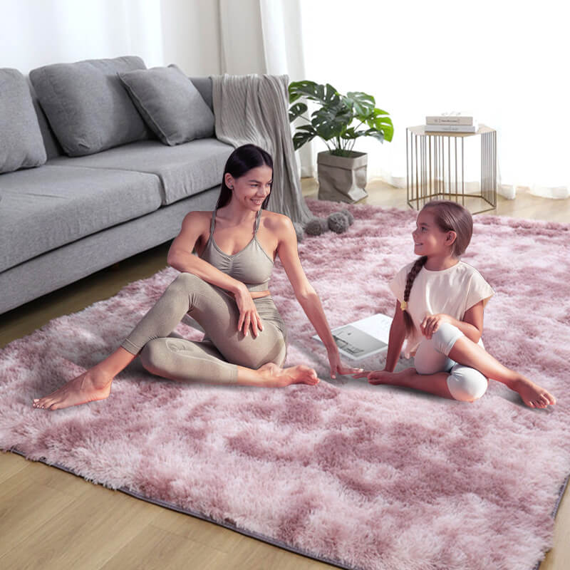 A soft gradient color plush floor mat by Arenzza, ideal for houseware and kitchen use, showcasing its cozy texture and vibrant design.