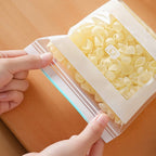Transparent Arenzza food-grade reinforced double-seal bags, kitchen storage, showing secure sealing and durable material.