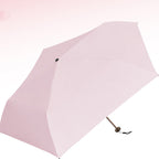 A lightweight, compact Arenzza all-weather umbrella open outdoors, showcasing its sturdy canopy and portable design.