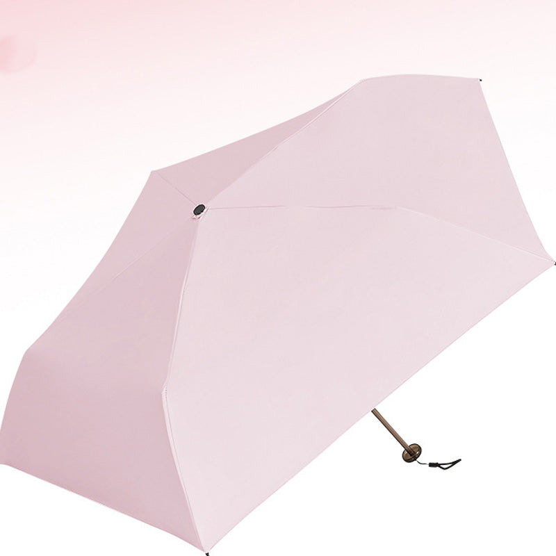 A lightweight, compact Arenzza all-weather umbrella open outdoors, showcasing its sturdy canopy and portable design.