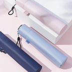 Arenzza ultra-lightweight compact all-weather umbrella open outdoors, showcasing durable fabric and sturdy frame in a vibrant color.