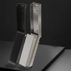 Arenzza magnetic stainless steel door stopper mounted on a door and wall in a modern kitchen setting.