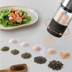 Arenzza electric pepper and salt grinder set on a kitchen countertop, featuring sleek black and stainless steel design.
