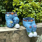 A creative 3D flower pot shaped like jeans from Arenzza, designed for houseware and kitchen decor.