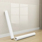 Arenzza transparent waterproof and anti-oil static adsorption wall sticker for kitchen walls, showing a sleek, clear design on a modern surface.