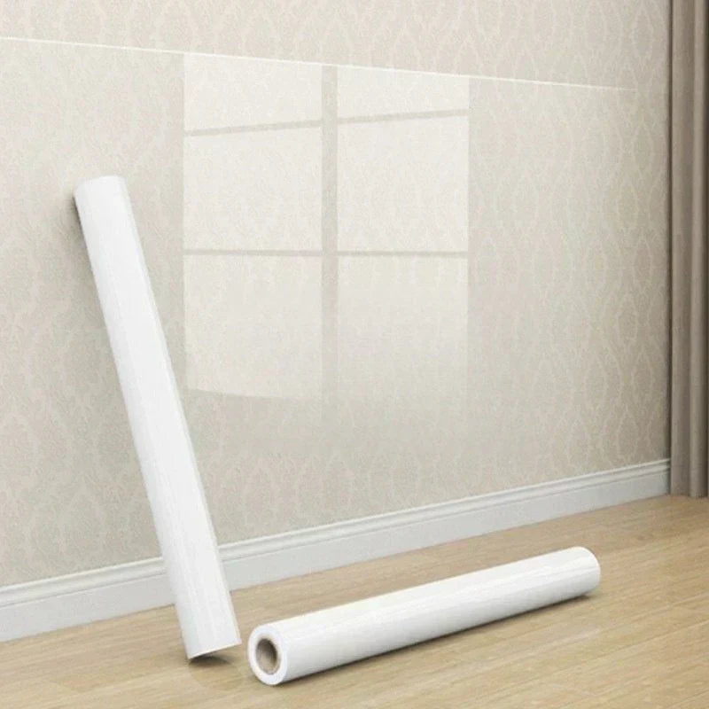 Arenzza transparent waterproof and anti-oil static adsorption wall sticker for kitchen walls, showing a sleek, clear design on a modern surface.