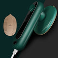 Aarenza Mini Portable Handheld Steamer for clothes, compact houseware device with water tank and steam outlet in a kitchen setting.