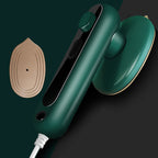 Aarenza Mini Portable Handheld Steamer for clothes, compact houseware device with water tank and steam outlet in a kitchen setting.