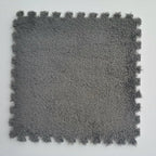 Arenzza plush patchwork foam floor mat with colorful rectangular sections for houseware and kitchen use.
