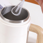 Arenzza rechargeable self-stirring mug with lid, houseware and kitchen product, showing the mug with a handle and lid on a kitchen surface.