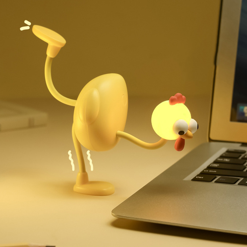 Aarenza flexible poseable chicken desktop lamp, houseware and kitchen decor, with a vibrant, whimsical chicken design on a desk surface.