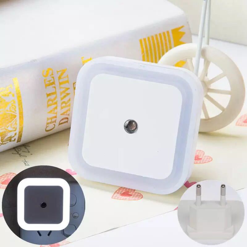 Arenzza LED smart light control sensor for energy-saving lamps, mounted on a wall in a modern kitchen setting.