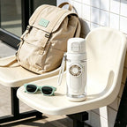 Arenzza portable cooling fan water bottle for home and kitchen, featuring a compact design with built-in fan and water bottle in a household setting.