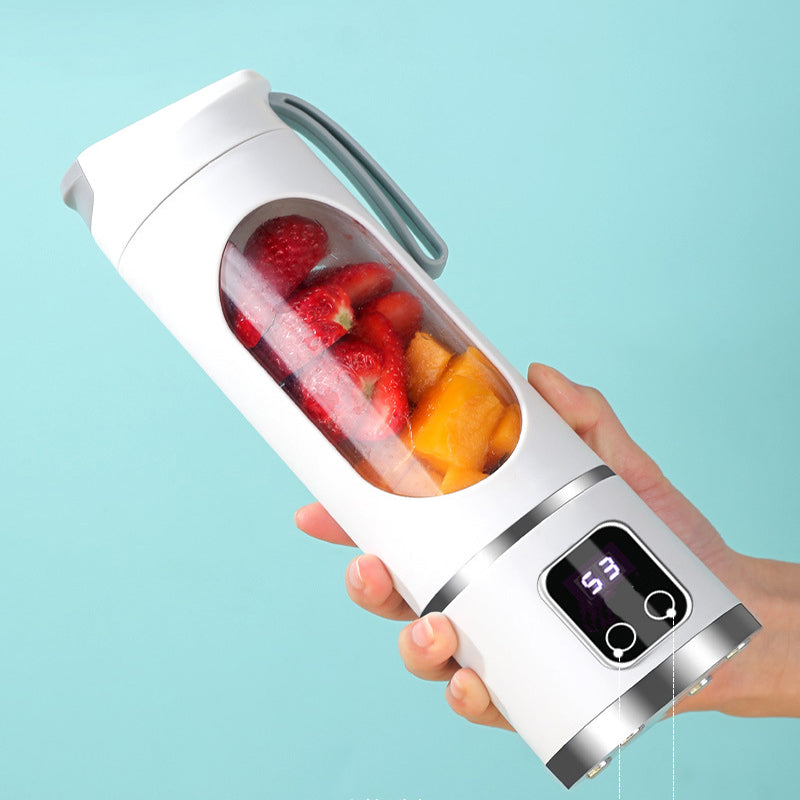 Arenzza portable cordless juicer in white with a transparent juice container, compact kitchen houseware for fresh fruit juice extraction.