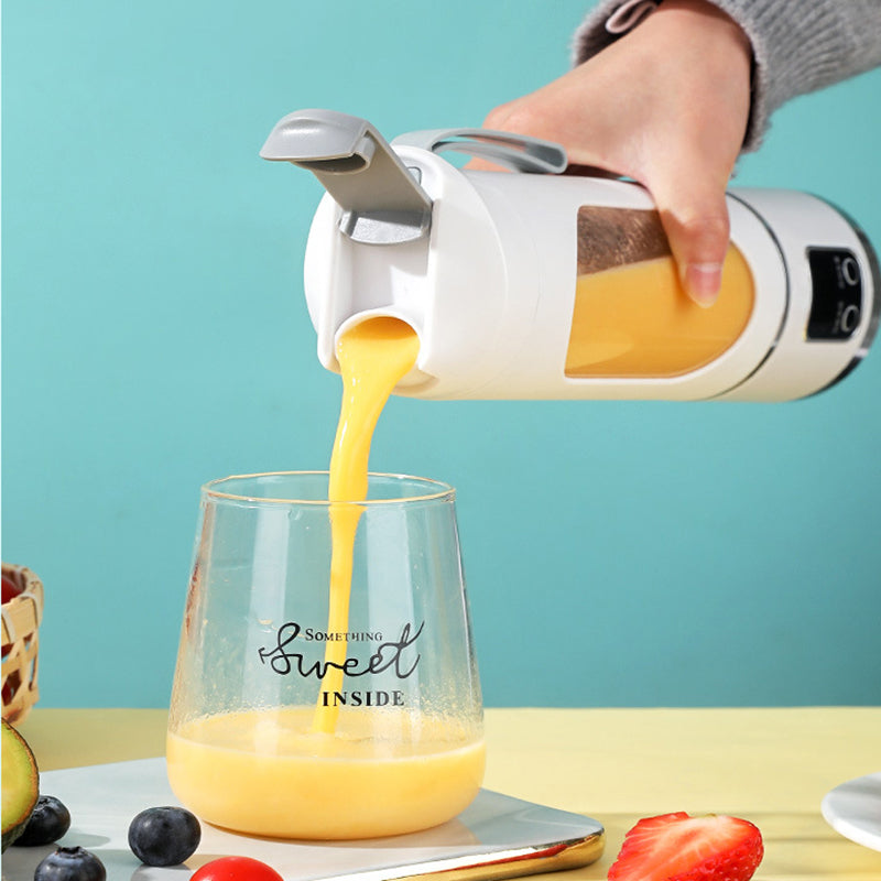 Arenzza portable cordless juicer in white with a transparent juice container and stainless steel accents, ready for use.