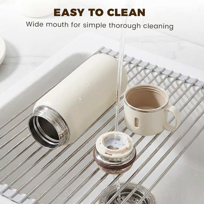 Arenzza stainless steel vacuum-insulated bottle with matching lidded cup, designed for hot and cold beverages in the kitchen.
