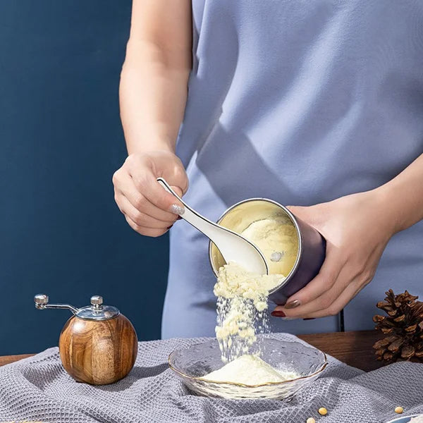 Arenzza portable grinder for beans and spices, compact kitchen houseware with stainless steel grinding chamber and ergonomic design.