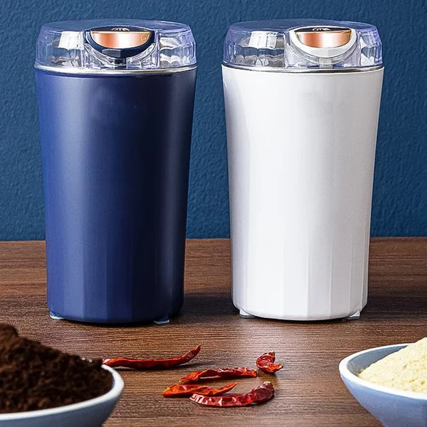 Arenzza portable grinder for beans and spices, compact kitchen houseware device with stainless steel grinding chamber.