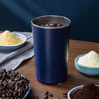 Arenzza portable grinder for beans and spices, compact houseware kitchen appliance with stainless steel grinding chamber.