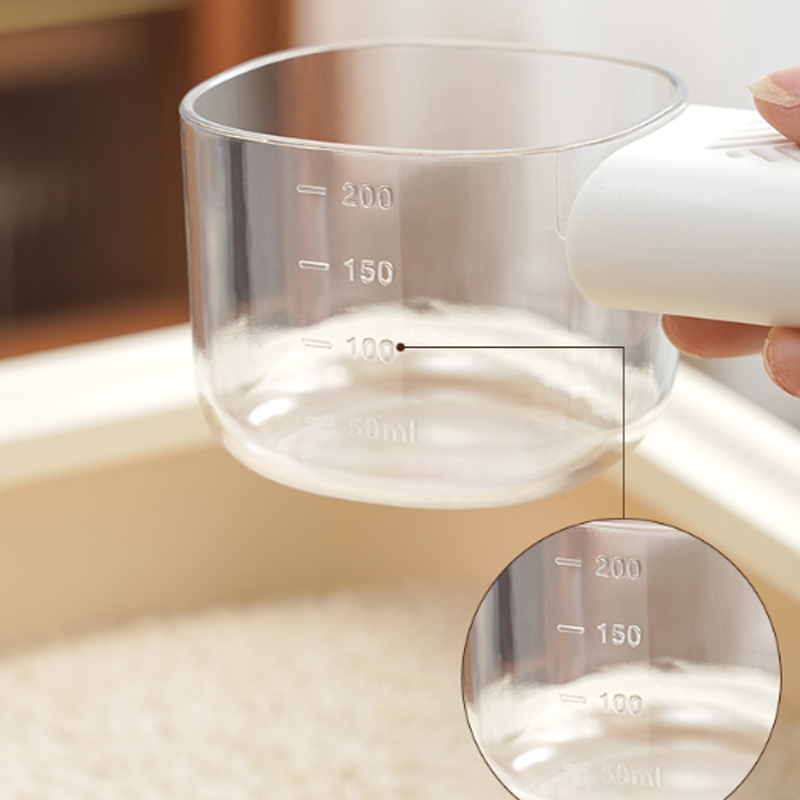 Arenzza multi-color food measuring scoop in a kitchen, showing different size sections for precise ingredient measurement.