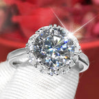 Elegant moissanite solitaire ring by Arenzza featuring a sparkling central stone and a sleek, polished band.