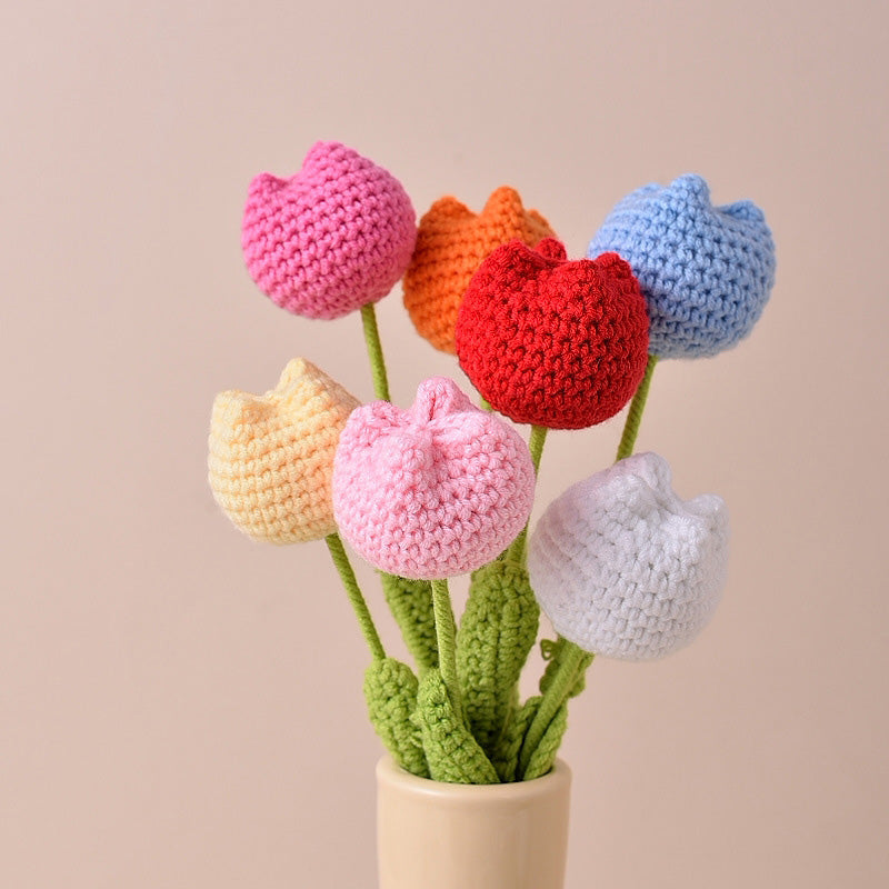 Handmade crochet roses and tulips jewelry accessories by Arenzza featuring colorful floral designs in detailed craftwork.