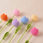Handmade crochet roses and tulips jewelry accessories by Arenzza, featuring colorful floral crochet flowers.
