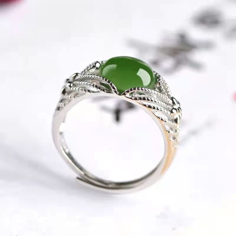 Adjustable Hetian jade ring for men and women, jewelry accessory featuring smooth green stone and elegant design by Arenzza