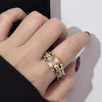 Aarenza heavy-duty vintage zirconia wide band ring showing intricate design and sparkling stones in a jewelry accessories image.
