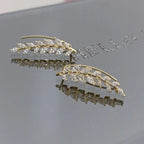 Arenzza elegant leaf stud earrings made of jewelry accessories, featuring delicate leaf designs in a refined style.